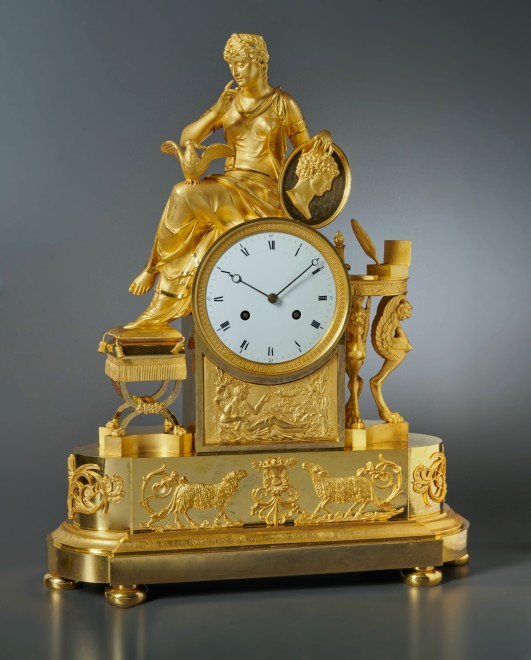 An Empire mantel clock of eight day duration housed in a case attributed to François-Louis Savart