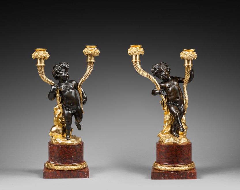 A pair of Louis XVI figural candelabra, attributed to Clodion