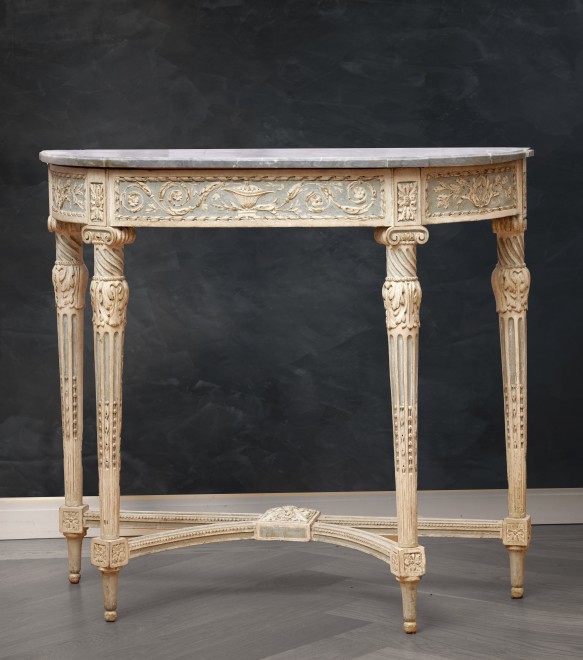 A Louis XVI demi-lune console table by Jean-François Dubut