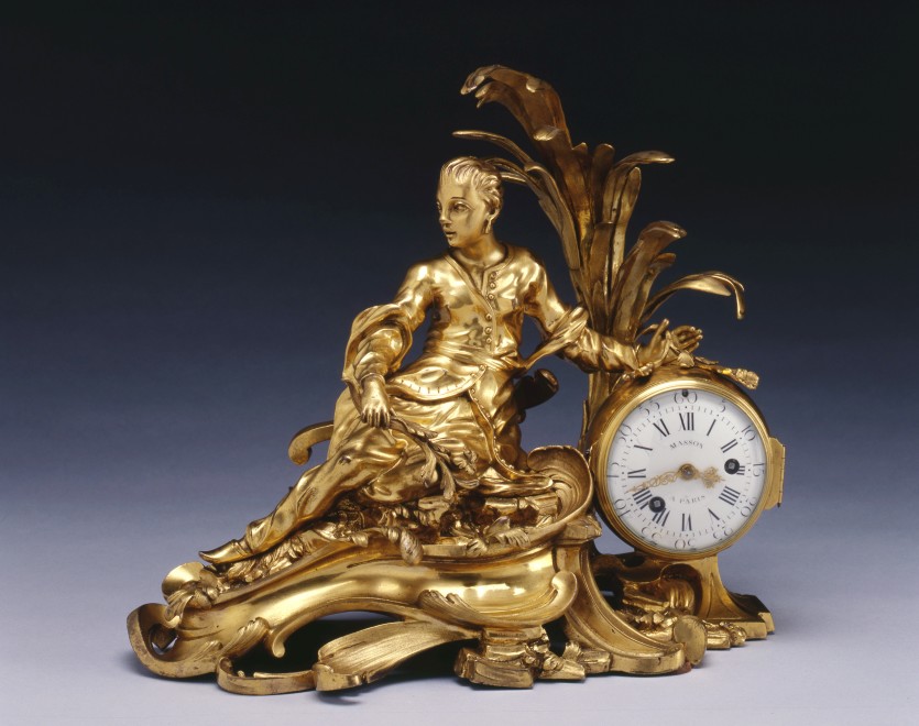 A Louis XV figural mantel clock à la Chinoise, by Masson, case attributed to Philippe Caffiéri