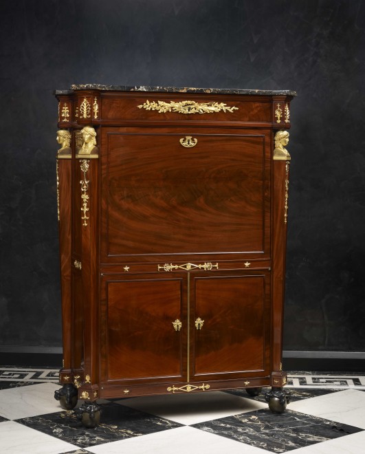 An Empire mahogany secrétaire à abattant and matching commode by Guillaume Benneman