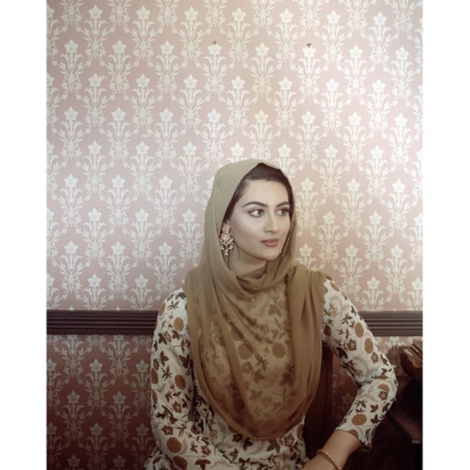 "Shalwar kameez dress, bedroom in Birmingham dress, bedroom" from the series Women from the Pakistani Disapora (2018) © Maryam Wahid