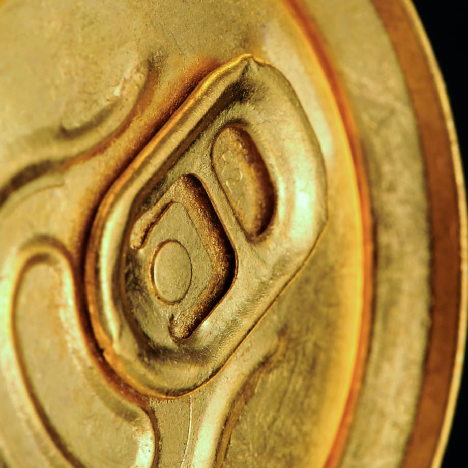 Tab detail of Article 2, a 2023 sculpture by Nic Phillipson, featuring an aluminium can gilded with 24 karat gold
