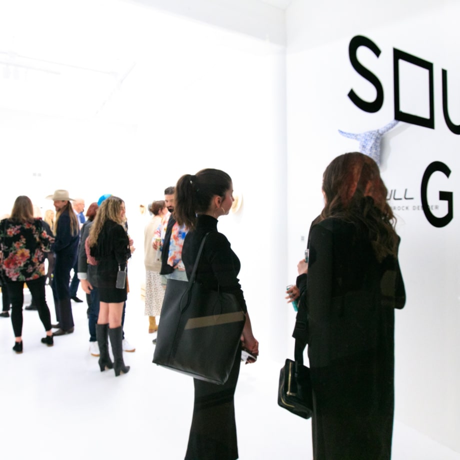 Guests at Brock DeBoer's solo exhibition "No Bull" opening reception