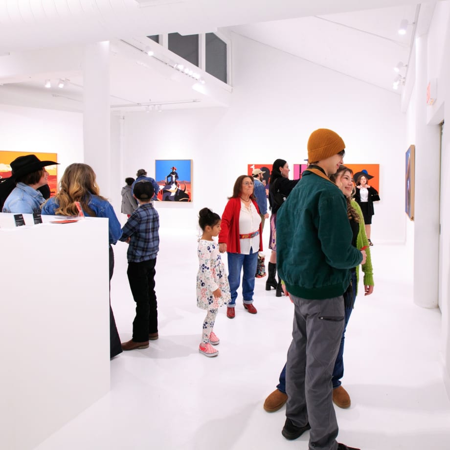Guests at Jeremy Booth's solo exhibition "Sweat & Blood" opening reception