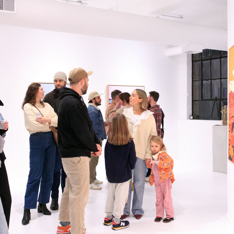 Guests at Jeremy Booth's solo exhibition "Sweat & Blood" opening reception