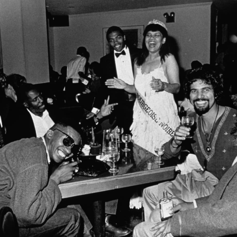 Lorraine O'Grady. Mlle Bourgeoise Noire celebrates with her friends, from Mlle Bourgeoise Noire Goes to the New Museum, 1980–83/2009. Silver gelatin fiber photograph.
