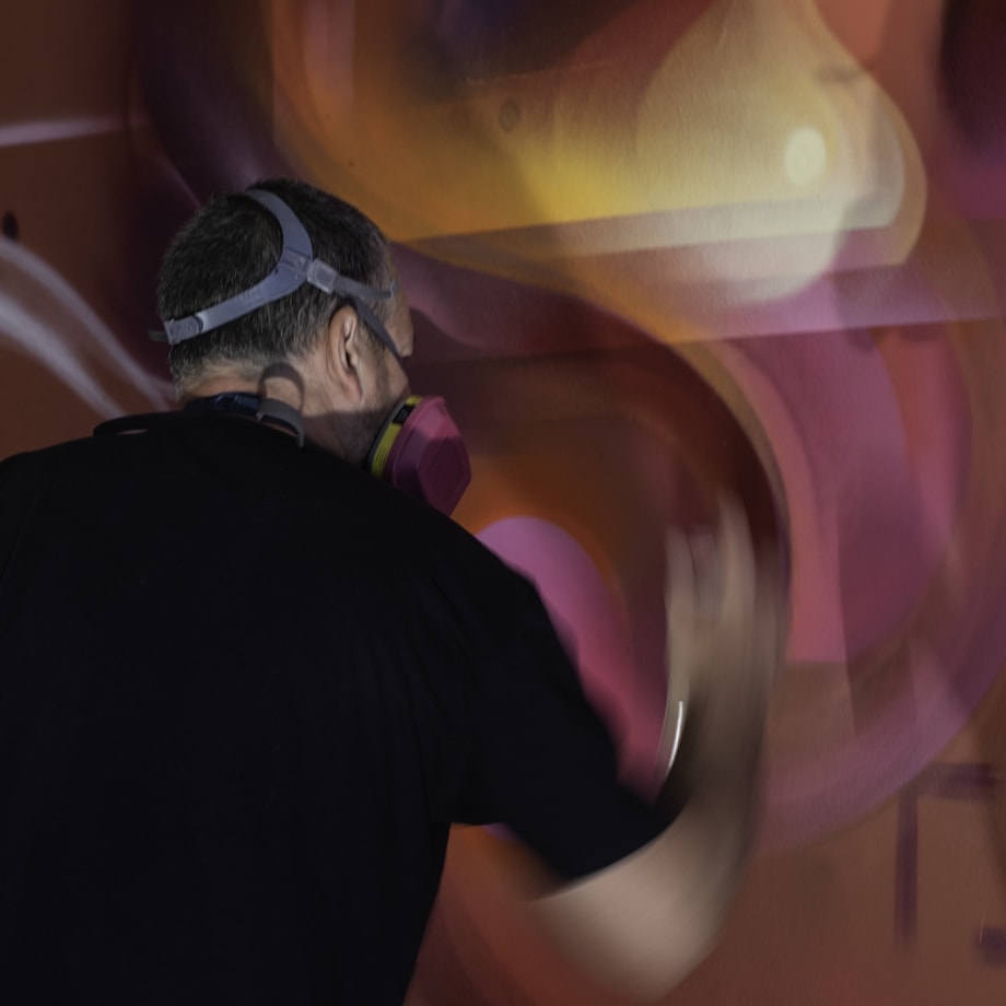 Mr. Cenz creating artworks in the hallway of the Victorian town house for disCONNECT (2020). Photo: Ian Cox.