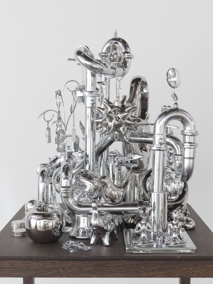 David Baskin, Chromed Curios, 2024, chromed plated metal, plastic, ceramic on wood base, 64 x 24 x 24 in (162. 6 x 61 x 61 cm). Courtesy the Artist and CHART. Photo by Elisabeth Bernstein.