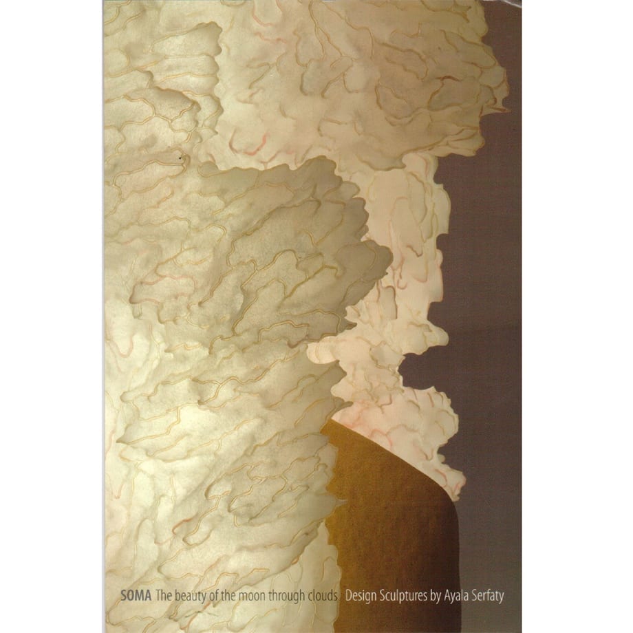 SOMA: The beauty of the moon through the clouds