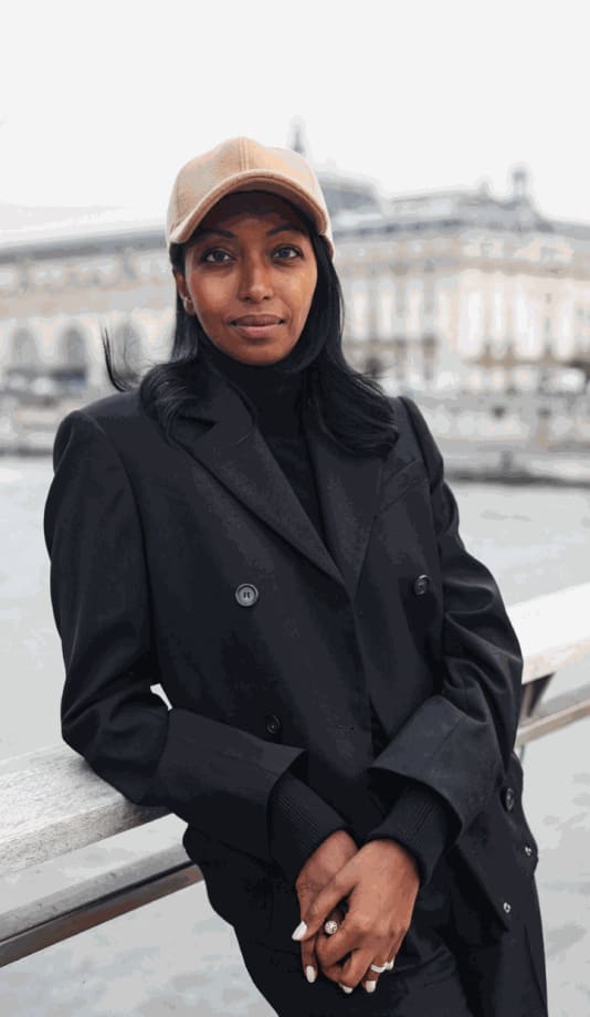 Ibrahim on the pedestrian bridge at the Musée d’Orsay. Photo by Stephanie Füssenich. Courtesy of Konfekt Magazine.