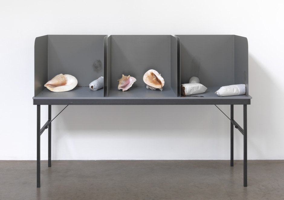 Untitled (Shells and Stubbed-out Cigarettes), 2011  Prototype voting table, shells, cigarettes  181.5 x 61.0 x 127.5 cm 71 1/2 x 24 x 50 1/4 in.