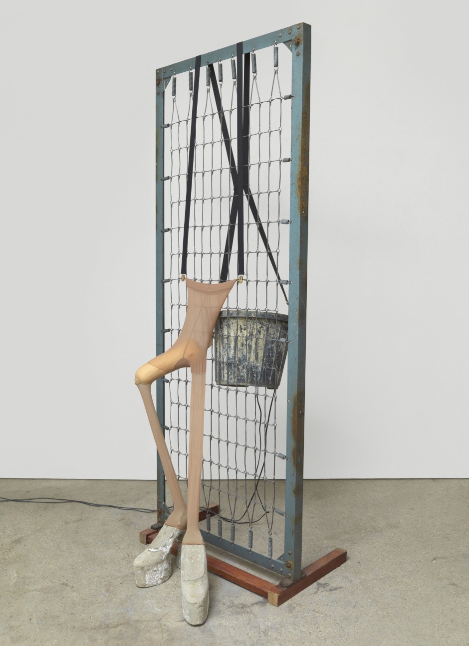 Man versus human nature-2012, 2005  plastic bucket, wood and steel bed base, braces, cement, nylon tights, butternut squash  194.3 x 76.2 x 45.7 cm  76 ½ x 30 x 18 in.