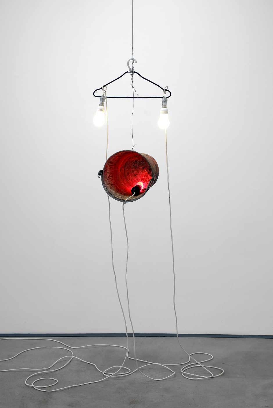 Sarah Lucas  Mary, 2012  bucket, hanger, lightbulbs, cable, wire  180 x 44 x 27 cm / 70 ⅞ x 17 ⅜ x 10 ⅝ in  © Sarah Lucas. Courtesy the Artist and Sadie Coles HQ, London.