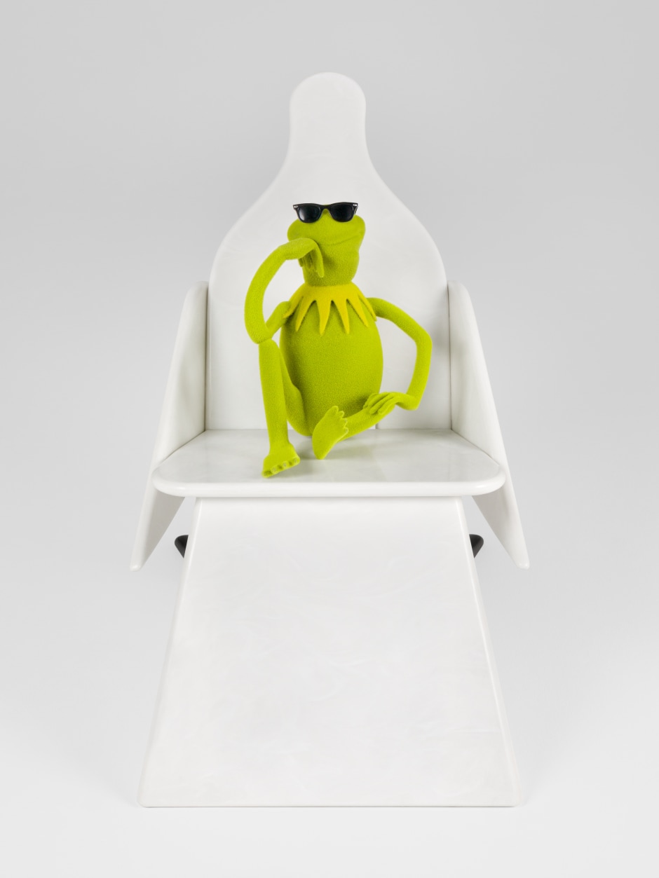 Cool Kermit, 2024  coloured Himacs, Stainless steel, fibreglass, acrylic, non flocking fibres, white gold  Overall dims: 91 x 60 x 96 cm / 35 ⅞ x 23 ⅝ x 37 ¾ in. Chair: 91 x 60 x 96 cm / 35 ⅞ x 23 ⅝ x 37 ¾ in. Kermit: 40 x 32.6 x 36.7 cm; 15 ¾x 12 ⅞ x 14 ½ in.