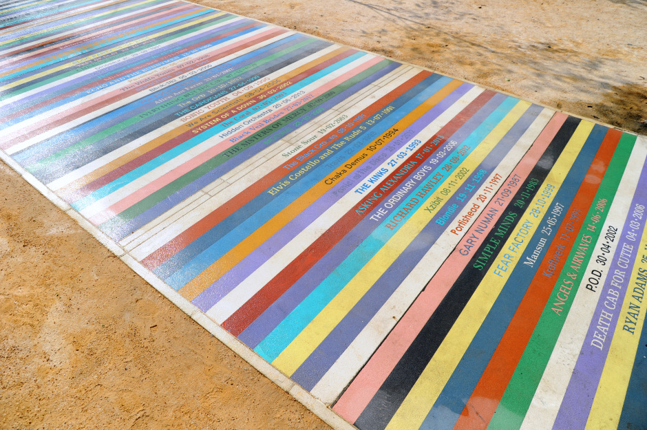 Jim Lambie  Untitled 2014  Coloured concrete  103 x 3 m  Public artwork, Barrowland Park, Glasgow  © Jim Lambie. Courtesy of the Artist and The Modern Institute/Toby Webster Ltd, Glasgow  Commissioned as part of the Glasgow 2014 Cultural Programme  Photo: Stephen Hosey