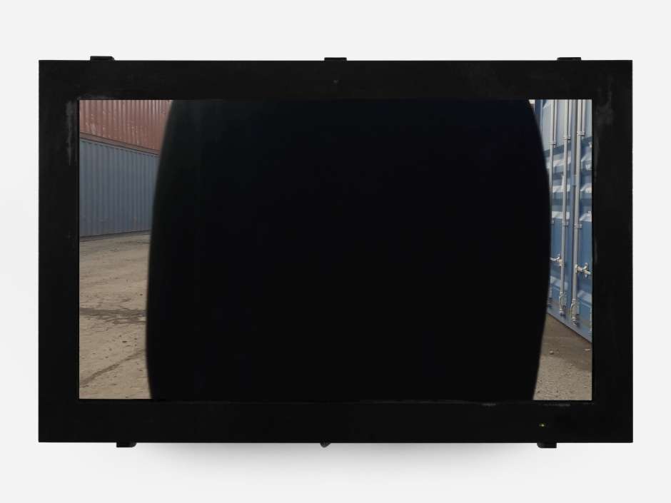 Untitled (Container), 2024  HD video, 55” digital display monitor, cameraman: Marco Bruzzone  89.5 x 139 x 36 cm / 35 ¼ x 54 ¾ x 14 ⅛ in dur: 12 min  © Klara Liden. Courtesy of the Artist and Sadie Coles HQ, London.  Photo: Katie Morrison