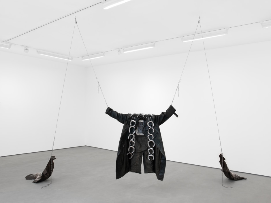 Elaine Cameron-Weir  hairshirt with lucky cilice SS 23 cartoon violence collection, 2023  horse leather trench coat, aluminum, bronze, spray paint, horseshoes, stainless steel, calf leather, studs  365 x 560 x 205 cm / 143 ¾ x 220 ½ x 80 ¾ in  © Elaine Cameron-Weir, courtesy The Artist  Photo: Katie Morrison