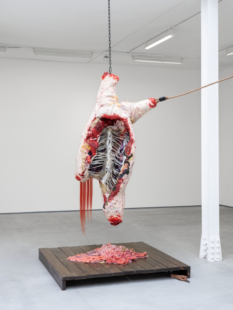 King Cobra/ Doreen Lynette Garner  In the Feast of the Hogs, 2022  silicone, steel pins, urethane foam, fabric, glass beads, crystals, pearls, white women cameos, blonde hair weave, tattoo ink  sculpture and plinth: 244 x 153 x 171.5 / 96 x 60 ¼ x 67 ½ in overall installation dimensions: 365 x 373 x 312.5 / 143 ¾ x 146 ⅞ x 123 in  © King Cobra/ Doreen Lynette Garner, courtesy the artist and JTT, New York  Photo: Josef Konczak / Sadie Coles HQ, London