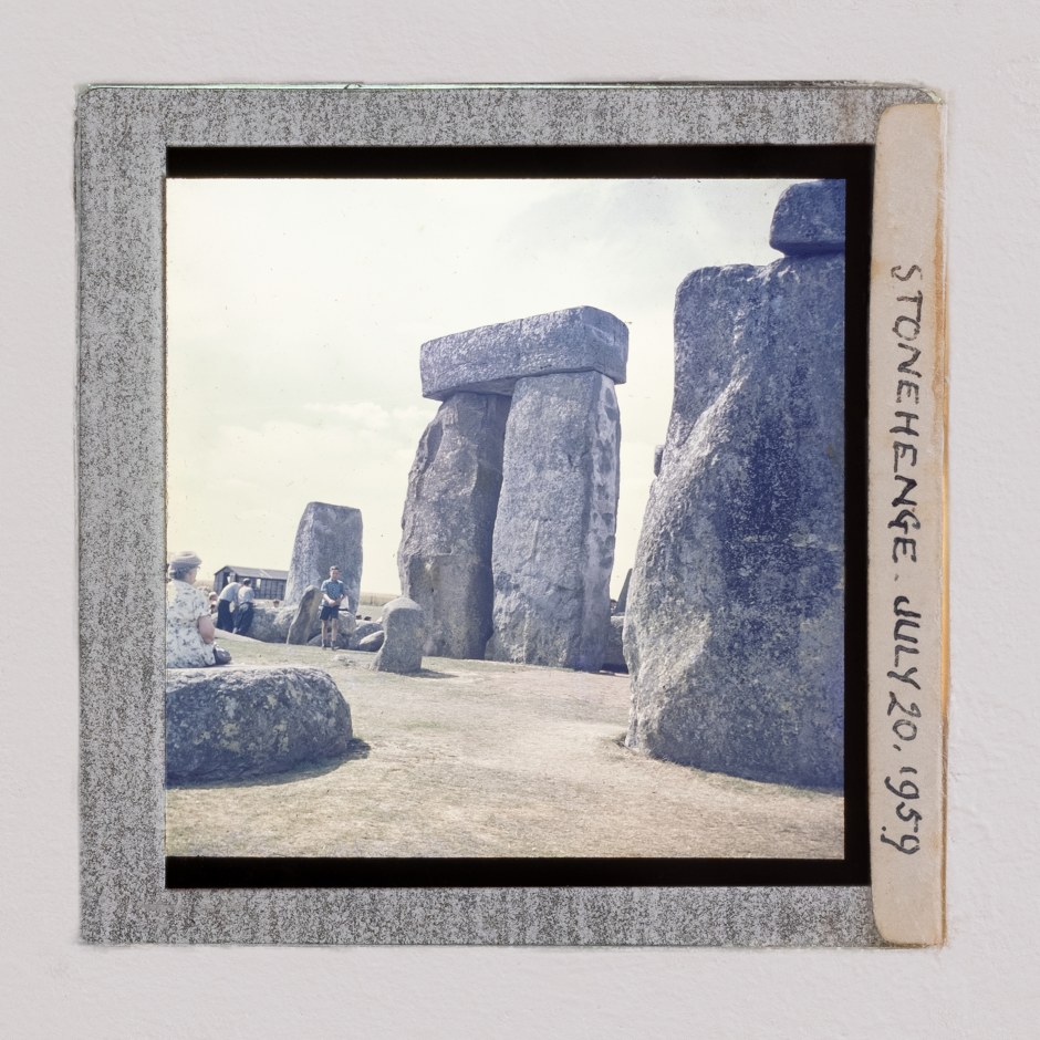 Megalithic Structures  Stonehenge 1959, and Avebury 1964 Agfacolor diapositives, each mounted and annotated unidentified photographer  7 x 7 cm / 2 ¾ x 2 ¾ in  Courtesy Simon Andrews and Sadie Coles HQ, London  Photo: Josef Konczak  Assembled around 2600 BC Avebury is the largest stone circle in Europe, and comprises of a henge with a large outer stone circle, with two smaller stone circles towards the centre of the monument. Approximately twenty-five miles away, lies Stonehenge, built over several stages around 3000 - 2000 BC. Geological research has confirmed that the smaller bluestones that form Stonehenge’s inner circle were quarried from North Pembrokeshire, some 160 miles away. The massive, iconic Sarsens were locally sourced and probably incorporated into the monument several centuries later. Avebury and Stonehenge are together sited within a dense complex of Neolithic and Bronze Age ceremonial sites, including hundreds of burial mounds, that together appear to collectively form a vast sacred landscape.   During the 1740s, the antiquarian William Stukeley linked both Avebury and Stonehenge with Druidic rites, inaugurating a wave of semi-occult Albion studies that offered a spiritual alternative to the mechanisation of British society, now at the dawn of the Industrial Revolution.   Using twelve-exposure film and a medium-format camera, the photographer carefully annotated the colour positives with the exact location and date of each frame. The portraits of the monumental sentinels that encircle the village of Avebury in Wiltshire are rendered to emphasise their solemn inertia, and are carefully void of contemporary human intrusion. The spectator is conscious that these rugged totems of an unclaimed spirituality have borne witness to the entire span of mankind’s evolution, transcending our modern impulse for familiar logic to instead summon a porous yearning for ceremony and congregation. By contrast, the images of Stonehenge celebrate that very request for communal engagement that is absent from the silent scenery of Avebury. A tentative yet intuitive curiosity guides the participants to connect with the timeless architecture of the site, spellbound by the need to gather. Invited by the resonance of ancient memory, the figures assemble to conquer, to contemplate, to caress, or simply to seek shelter in the long shadows of Midsummer.