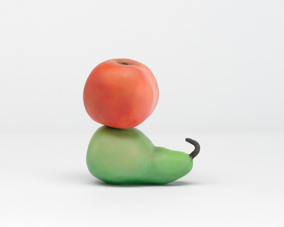Urs Fischer  Peach and Pear, 2016  cast bronze, oil paint  13 x 12 x 8 cm / 5 1/8 x 4 3/4 x 3 1/8 in  Peach and Pear, 2016, forms part of a microcosm of small-scale hand-painted and raw bronze sculptures. Here a life size version of a cast peach is perched precariously on top of a pear, in a gesture that is both witty and playful. The intimately scaled sculptures are like poetic vignettes that depict unusual interactions: they are delicate yet at the same time imposing, comical and shadowy as if they were hiding an allegorical secret. The humorous reveries take the form of a satirical play on ordinariness that build a kaleidoscopic anthology of Fischer’s imaginary, drawn from fragments of his career and aesthetics.