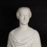 A bust of a woman in white marble