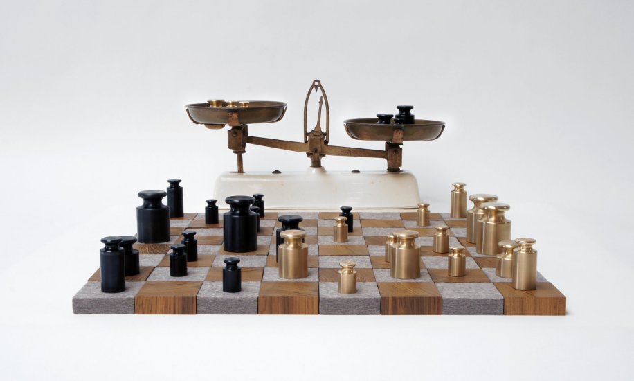 <p><strong>Rolf Sachs</strong>, Weighing up the Competition chess set, 2012</p><p>Brass, enamel, teak, felt, vintage scales</p><p>Board: 56 W x 56 D x 2.2 H cms</p><p>Edition of 1 plus 1 Artist's Proof</p>