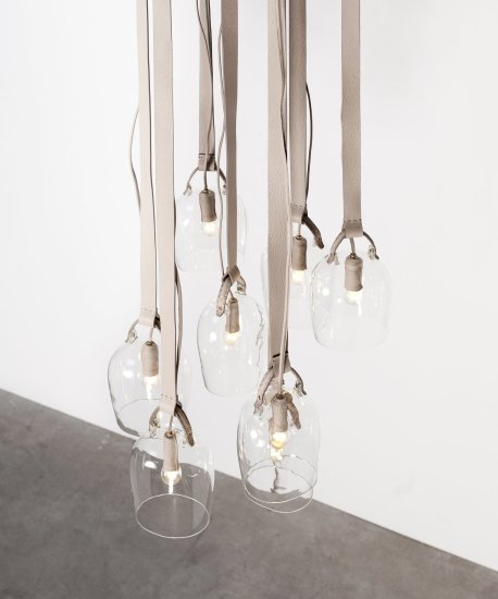 <div><p><strong>Formafantasma</strong>, Craftica Fendi Bell Lights, 2012</p><p>Discarded Fendi leather, glass, leather-covered hooks, leather-covered electric wire</p><p>Set of 7</p><p>Photography by Luisa Zanzani</p></div>