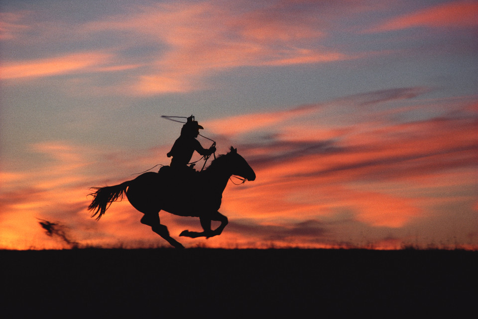 Image: Norm Clasen  Sunset Chase, Riverton, WY, 1985  signed, titled, dated and numbered on artist label verso  archival pigment print  40 x 60 inches, edition of 5 plus 2 artist’s proofs  26.5 x 40 inches, edition of 9 plus 2 artist’s proofs  16 x 24 inches, edition of 15 plus 2 artist’s proofs