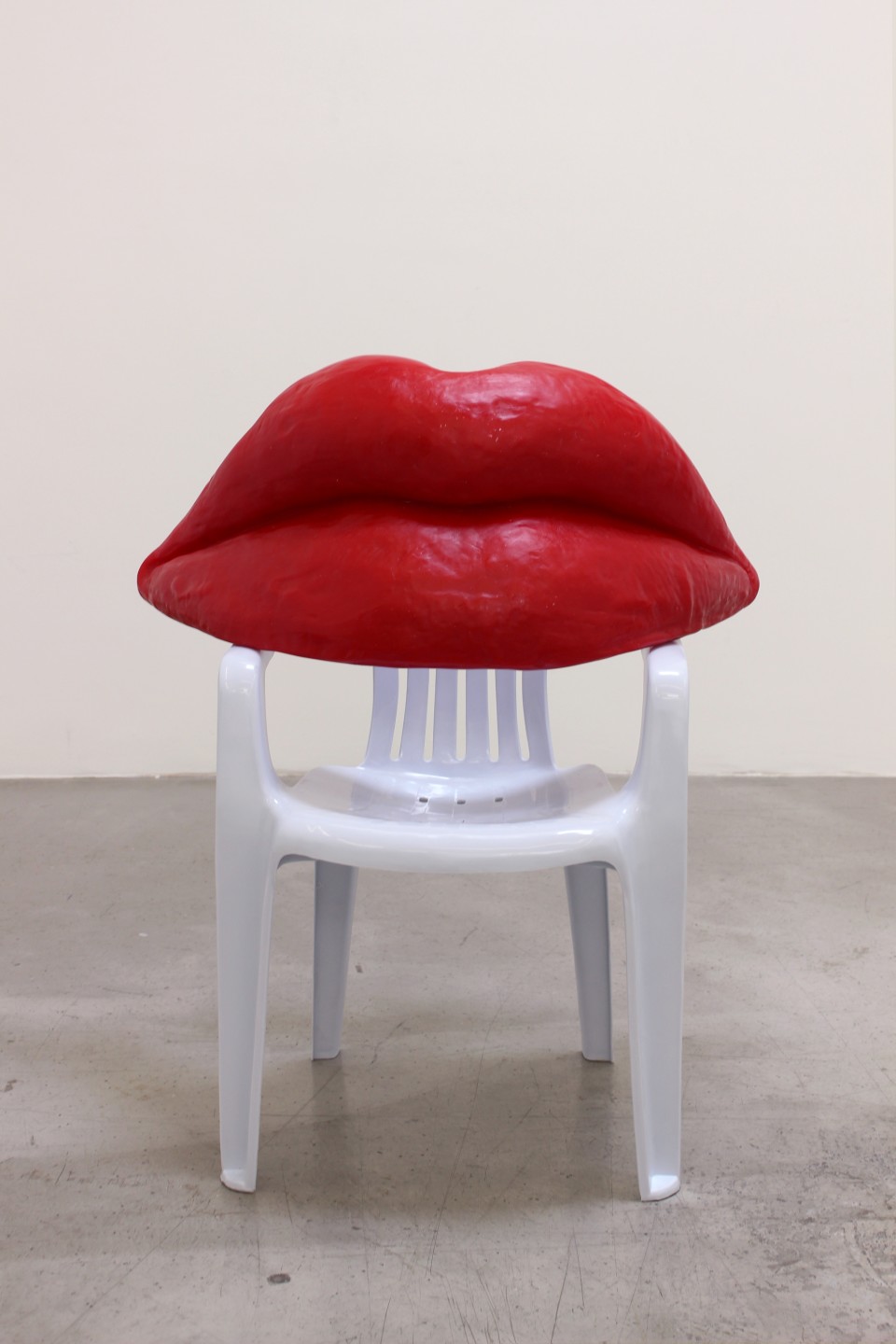 Image: Nevine Mahmoud  Wax Lips seated, 2021  polyester resin, plastic, plastic chair, and steel hardware  38 x 32 x 20 inches