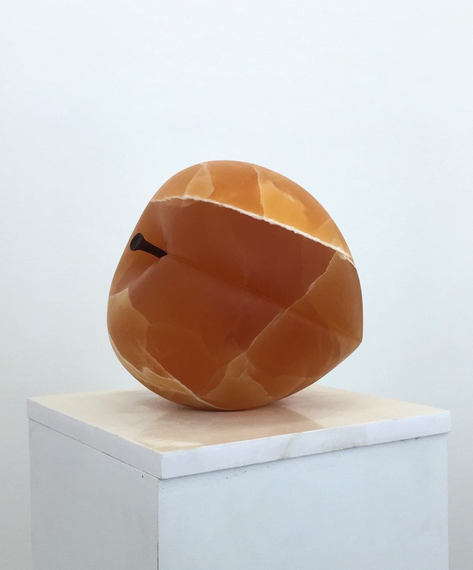 Image: Nevine Mahmoud  Peach Object, 2016  carved calcite, carved steel  sculpture: 11 x 11 x 11 inches base: 15 x 15 x 3/4 inches  unique